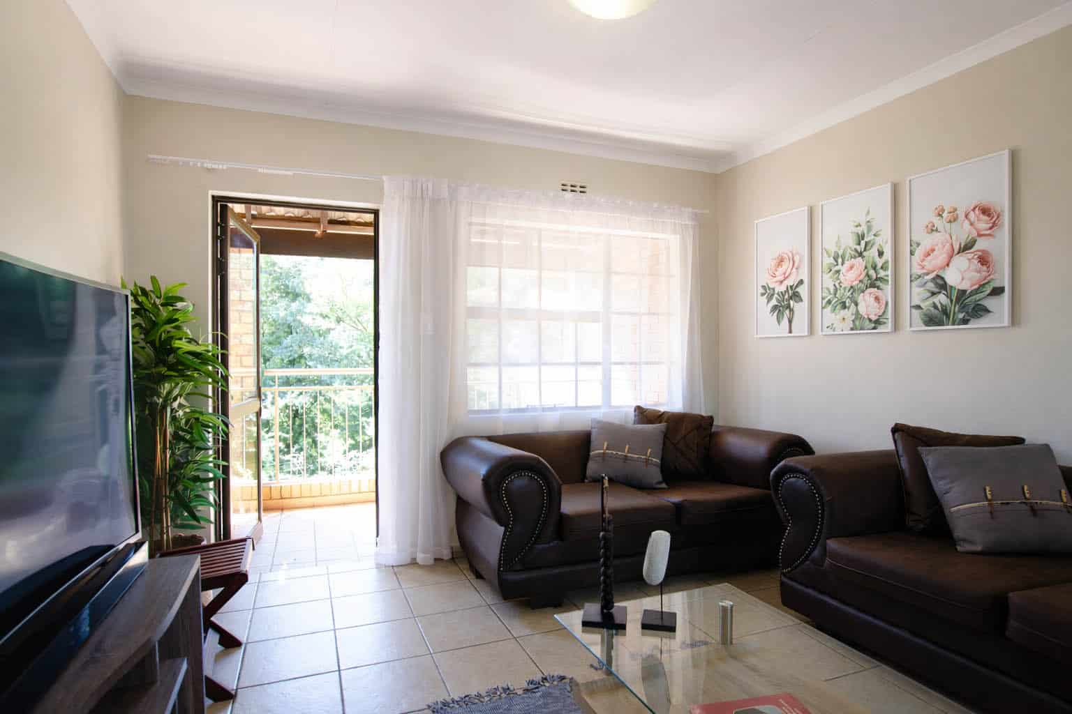Sunlit lounge with access to the balcony